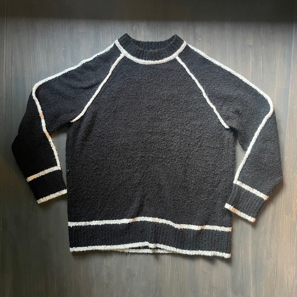 Elegant Black and White Turtleneck Sweater